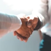 Men and women negotiate to congratulate a successful business ,Shaking hands concept.