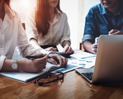 Business financial, Business accountant and discussing with partner are meeting to audit finance planning sales to meet targets set in next year. budget plan concept.
