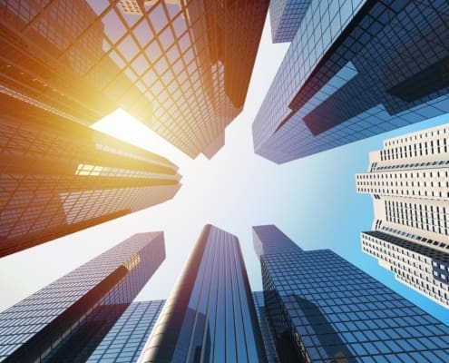 3d rendering of corporate buildings with sunlight