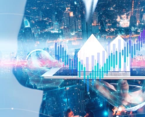 Businessman holding tablet with city hologram show a financial stock market increase profit. Decentralized bullish economy gain price positive graph. Cyber punk network theme color concept.