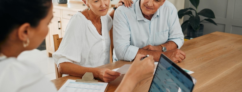 Financial advisor consultation with clients on retirement, finance planning or investment and document on laptop screen. Accountant woman, senior people and pension advice, asset management or budget