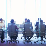 Exit negotiations in a board room through a plate glass window