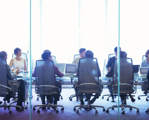 Exit negotiations in a board room through a plate glass window