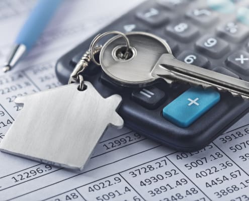 Real estate, keychain with house symbol. Key with finance blank.